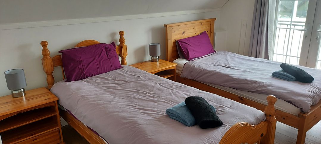 Surf-ready apartment with sea views in town