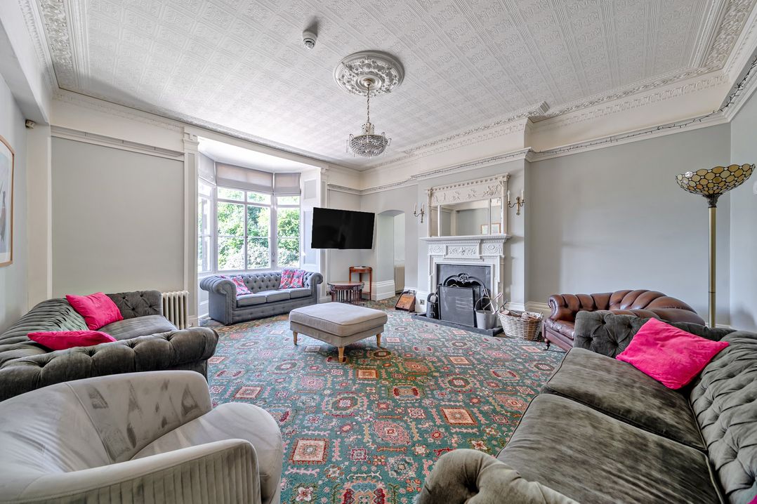 A living room with sofas and a coffee table at Milton Manor in Milton On Stour