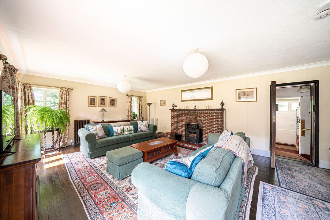 A living room with a sofa and coffee table at Primrose Spinney in Highwood near Ringwood