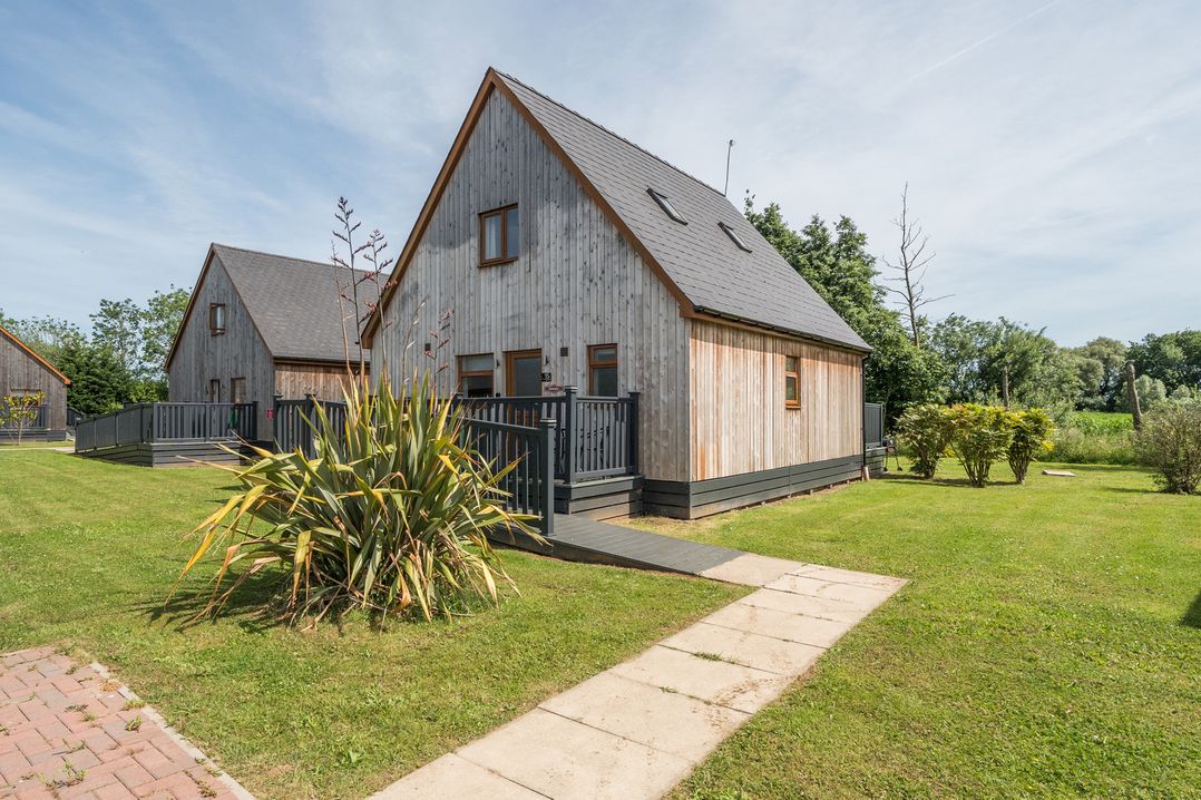 A house with a garden and pathway at Paddington Lodge near Brigg