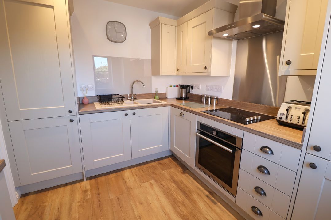 A kitchen with modern fixtures and appliances at Lapwings, Aldeburgh
