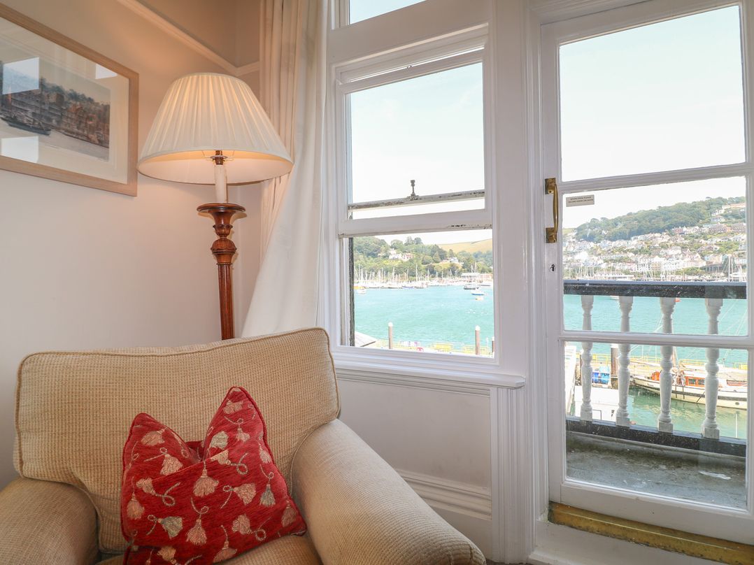 A living room with a view of the water at 2 York House in Dartmouth