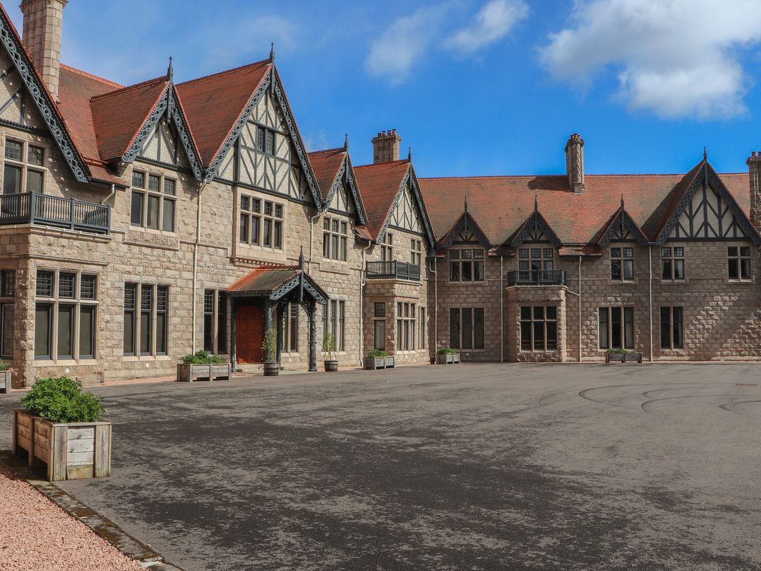 A building with a courtyard at Macdui - Mar Lodge Estate in Braemar