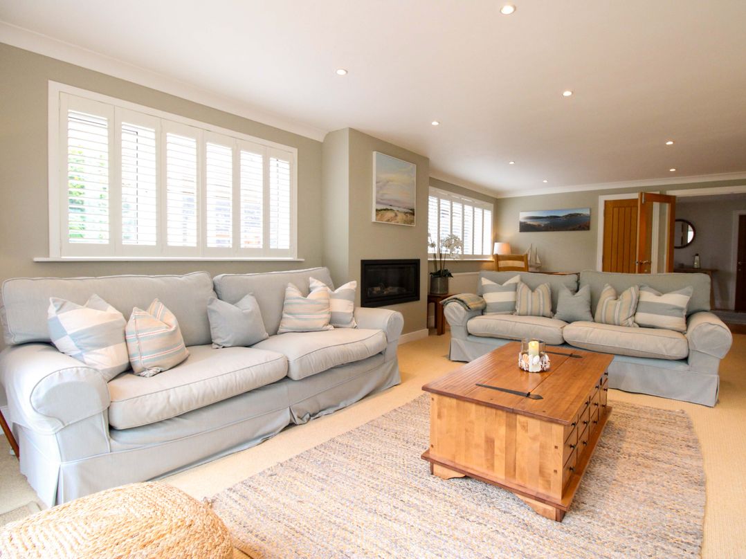A living room with sofas and a coffee table at Welsummer Salcombe