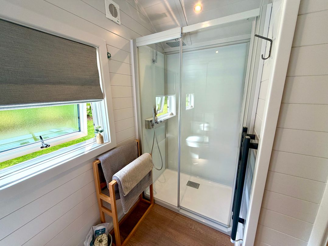 A bathroom with a shower and a window at No Deer in Ashbourne