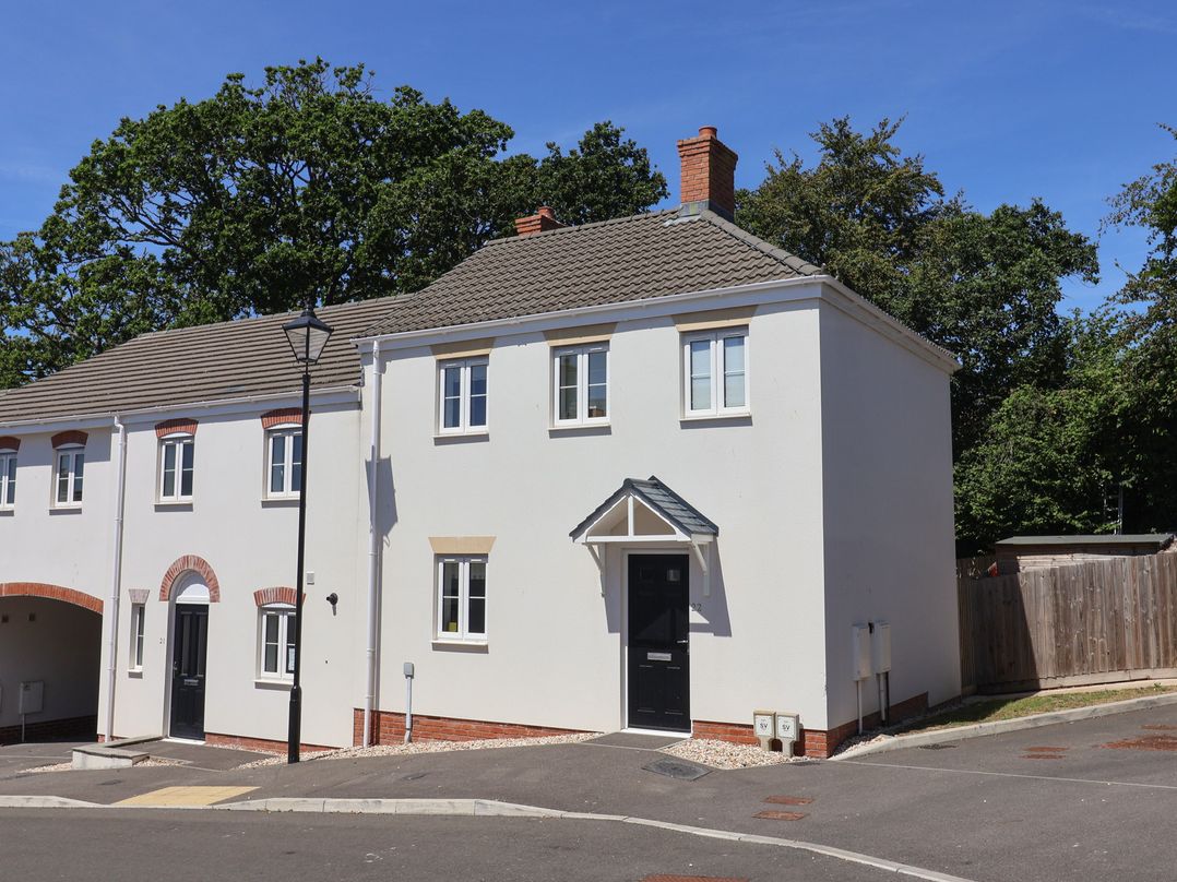 A house with windows and a door at 22 Applebee Way Lyme Regis