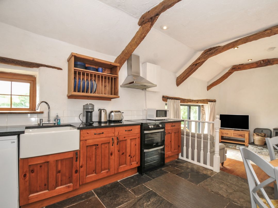 A kitchen with sink and cabinets at Skiber Long Bray Shop near Launceston