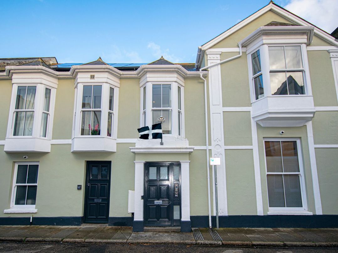 A building facade with doors and windows at Daniel Chambers in Camborne
