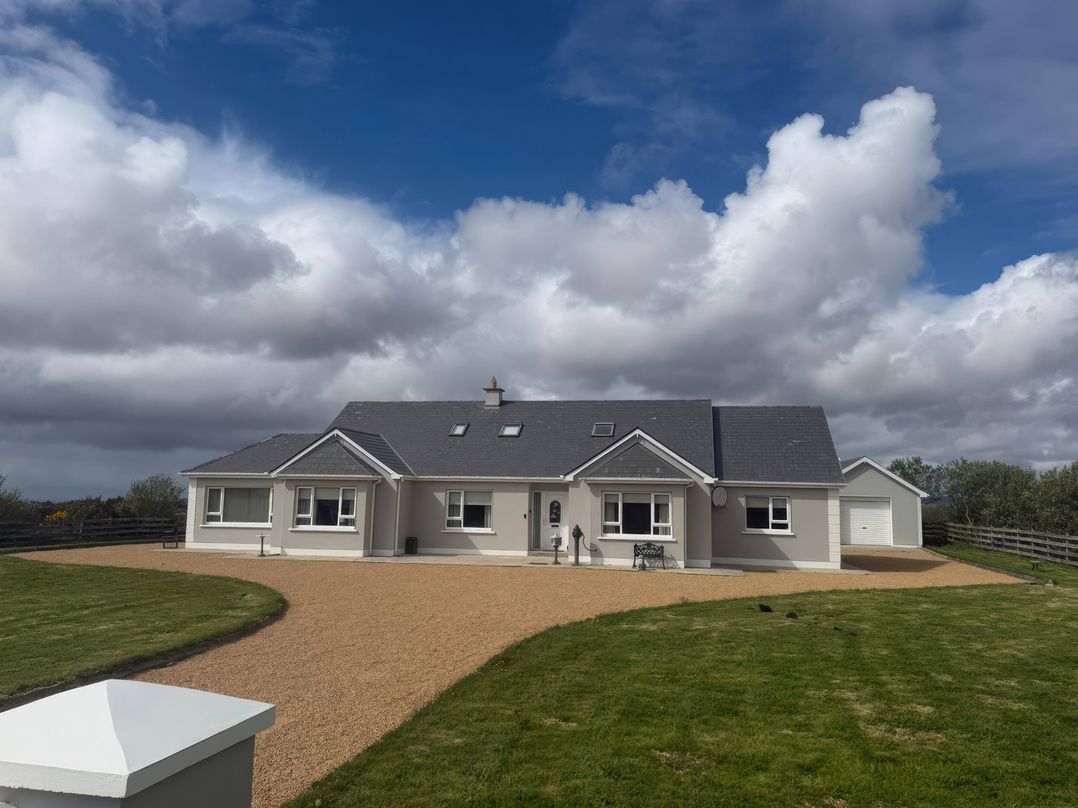 Storey and Half House