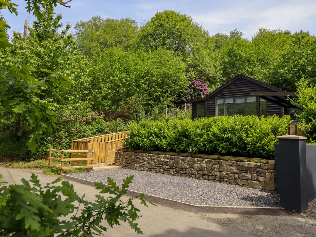 A house with garden and gate at Lodge at Nadur Commins Coch near Machynlleth