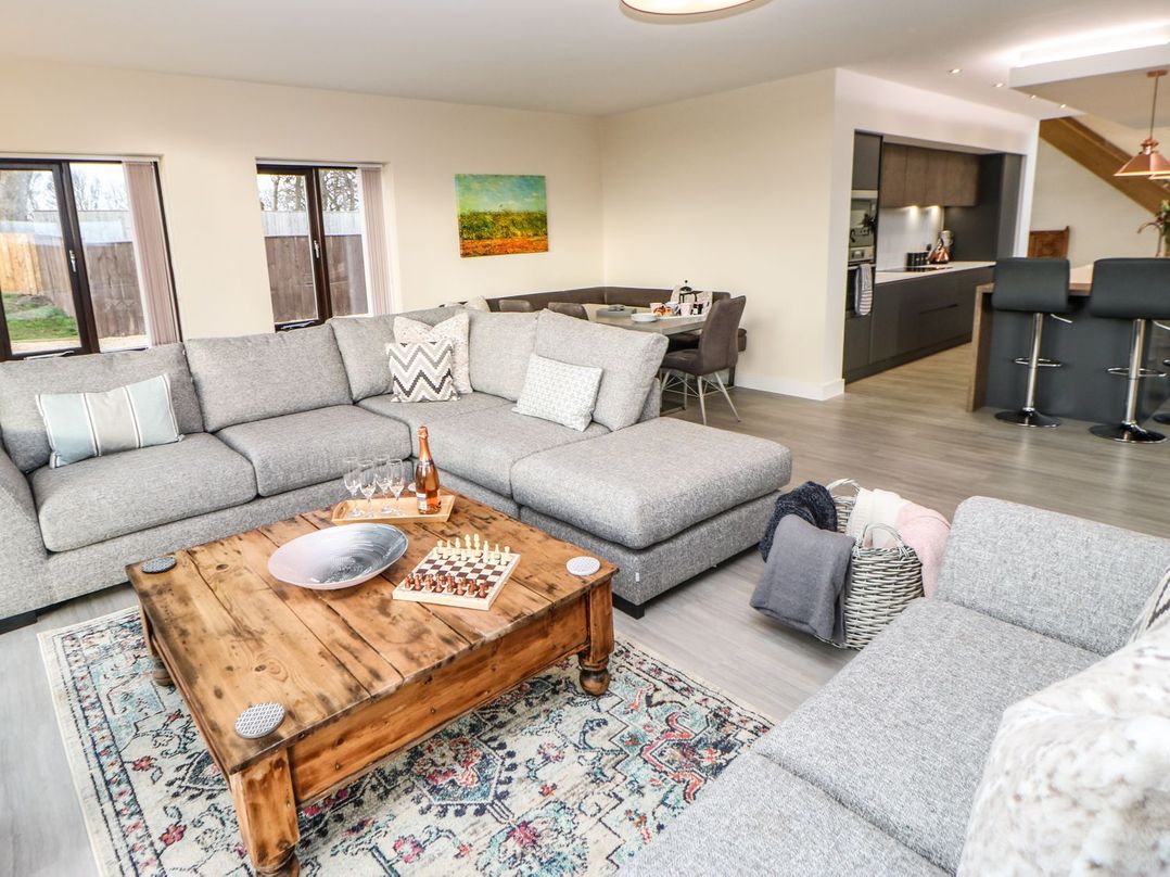 A living room with a sofa and coffee table at High Church Hill in Durham