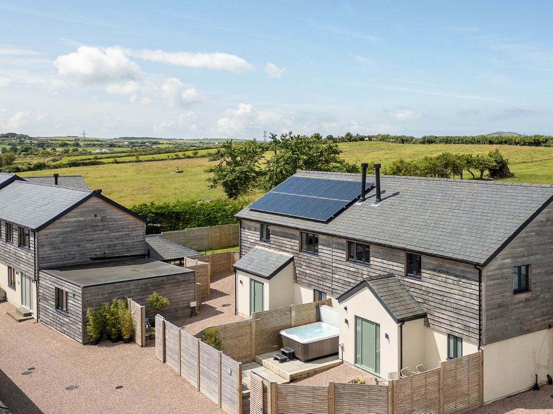 Houses with solar panels and a hot tub at Bell House in Llanfechell