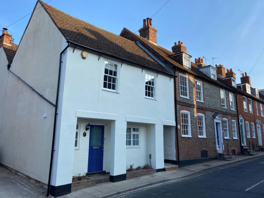 A house with blue door and multiple windows at 19 Queen Street in Emsworth