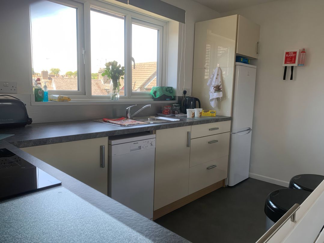 A kitchen with a sink and countertop at Amber House Dorchester