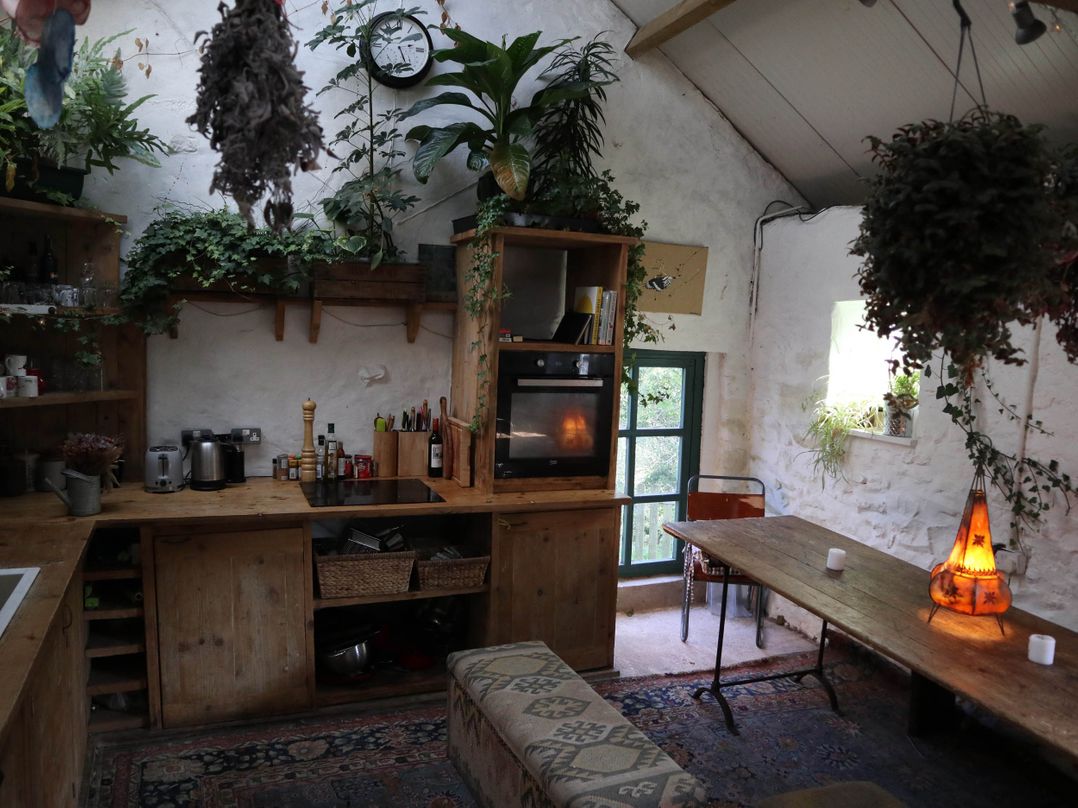 Yurts, barn and fire pit in a Snowdonia valley