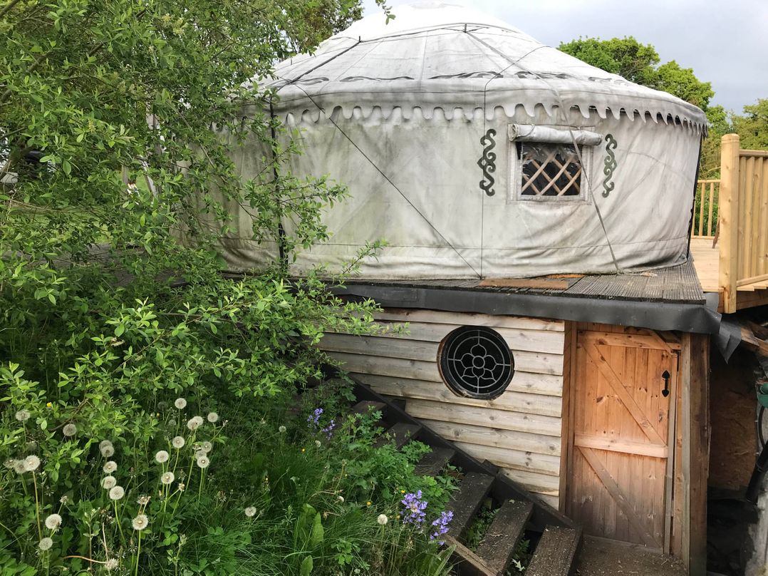 Yurts, barn and fire pit in a Snowdonia valley
