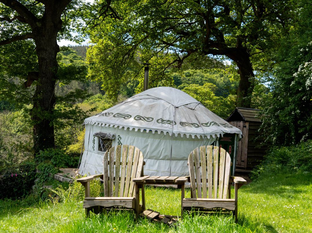 Yurts, barn and fire pit in a Snowdonia valley