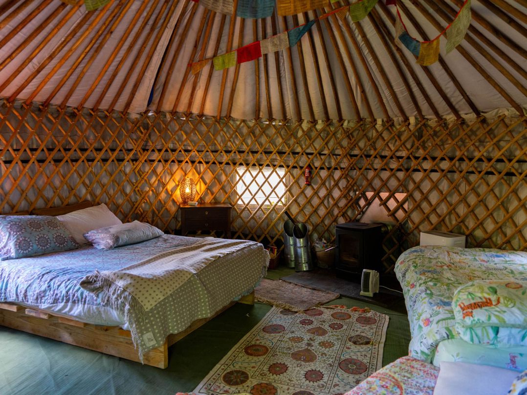 Yurts, barn and fire pit in a Snowdonia valley