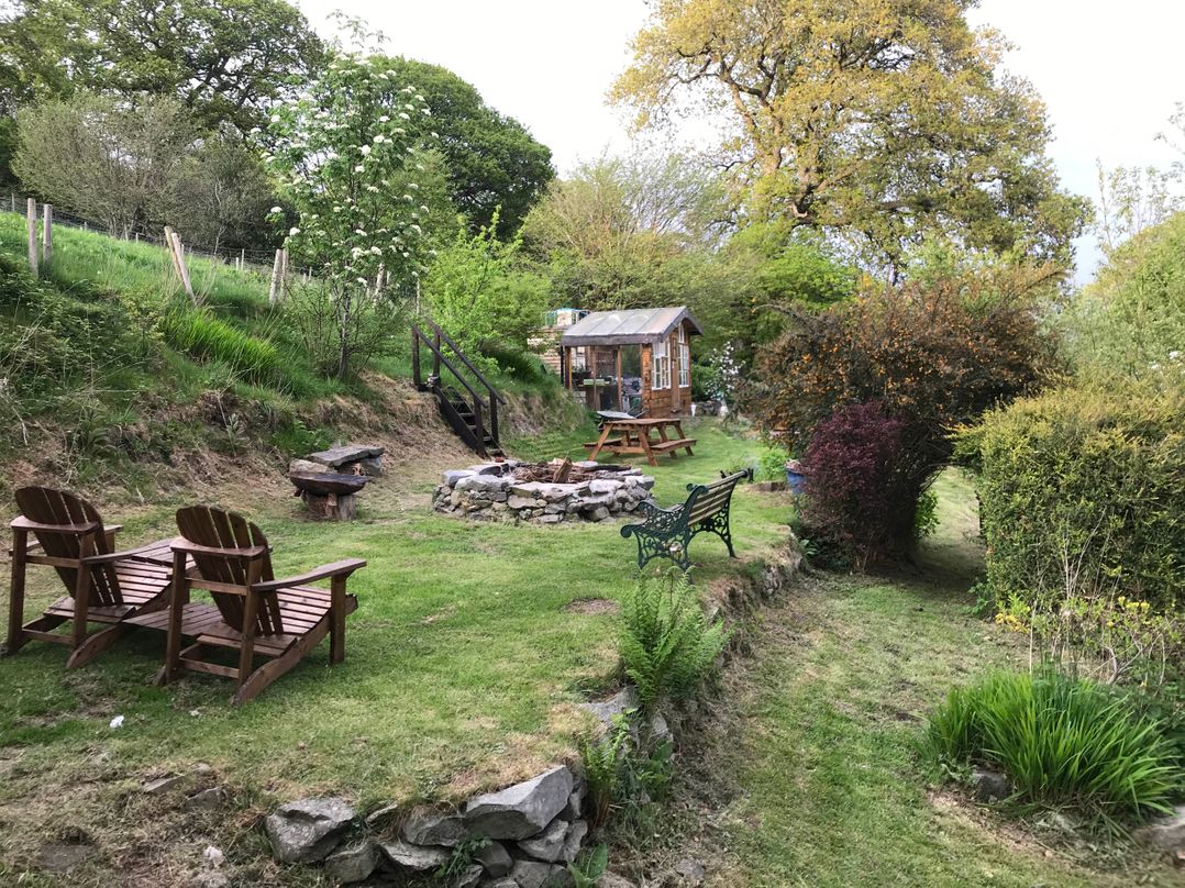 Yurts, barn and fire pit in a Snowdonia valley