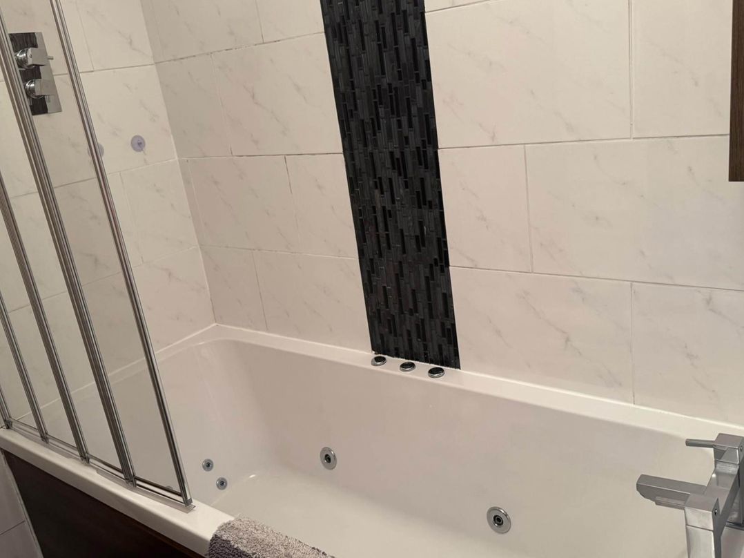 Spacious family base with garden near Loch Ness