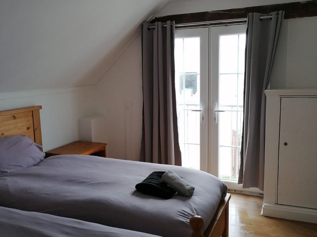 Surf-ready apartment with sea views in town