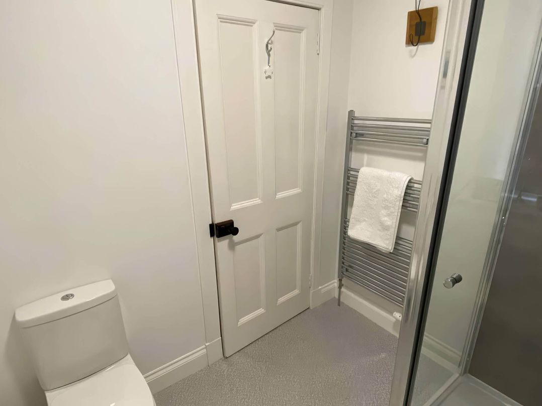 Pet-friendly coastal flat with fire pit and views