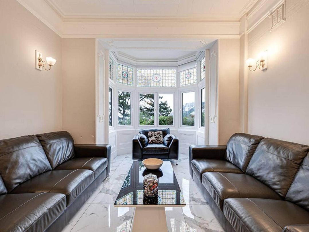 Tudor hall with hot tub, games room and sea views