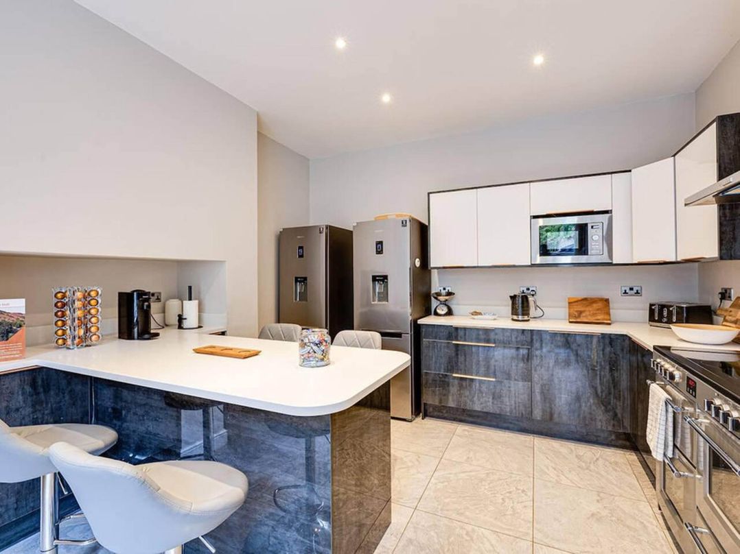 Tudor hall with hot tub, games room and sea views