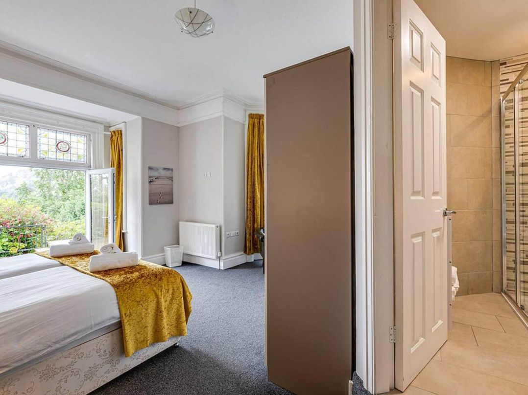 Tudor hall with hot tub, games room and sea views