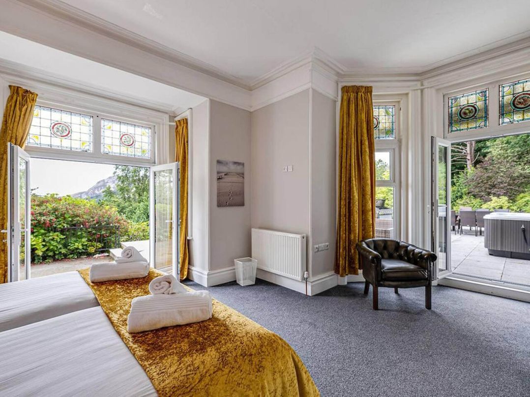 Tudor hall with hot tub, games room and sea views