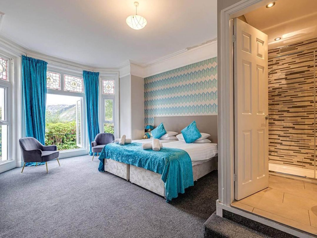 Tudor hall with hot tub, games room and sea views