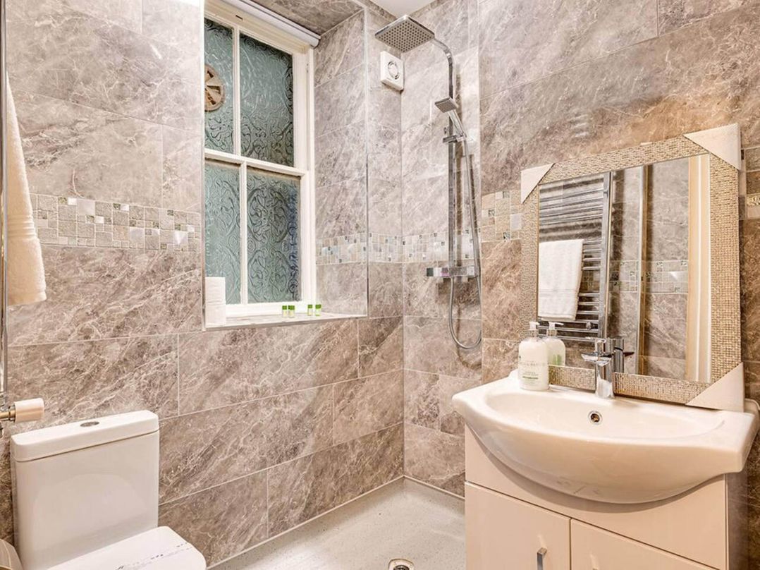 Tudor hall with hot tub, games room and sea views