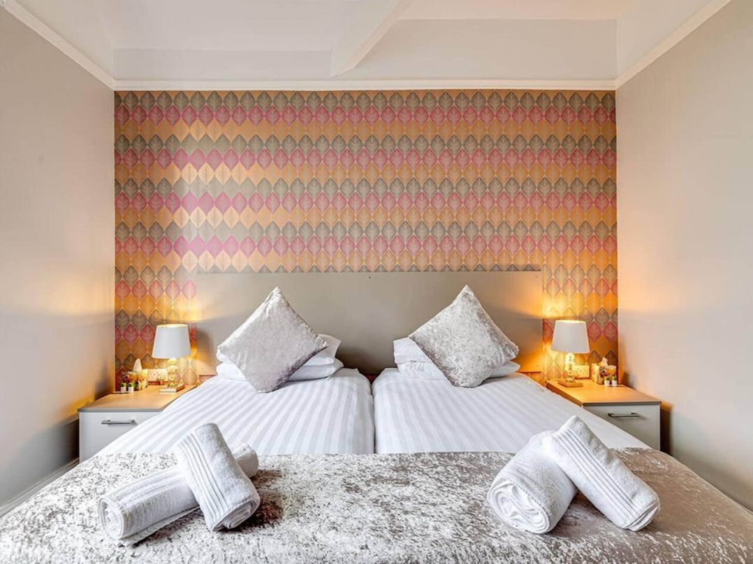 Tudor hall with hot tub, games room and sea views