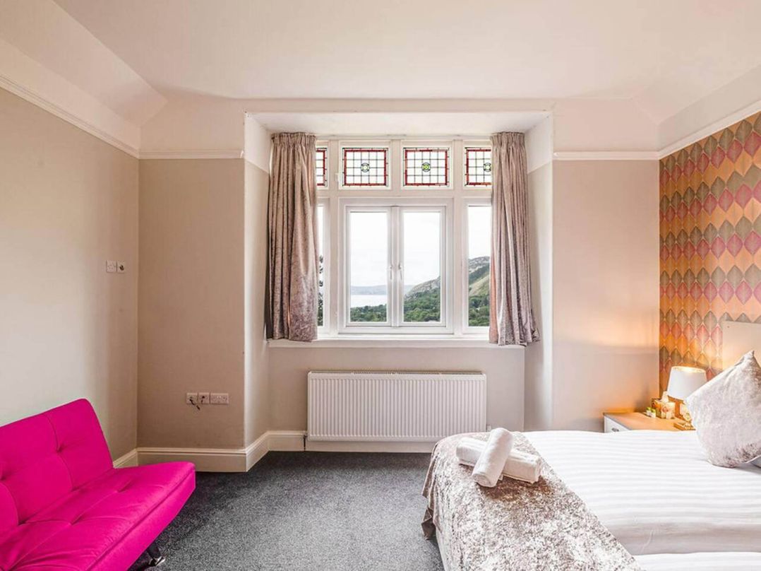 Tudor hall with hot tub, games room and sea views