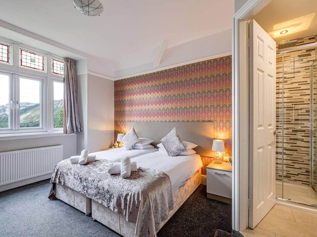 Tudor hall with hot tub, games room and sea views