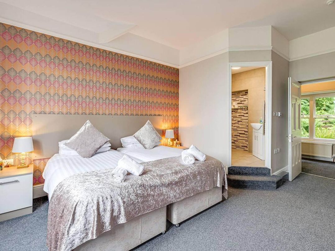 Tudor hall with hot tub, games room and sea views