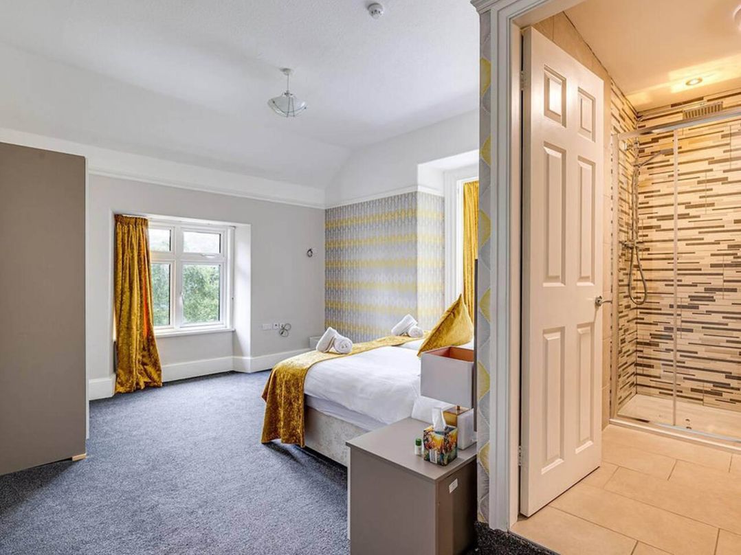 Tudor hall with hot tub, games room and sea views