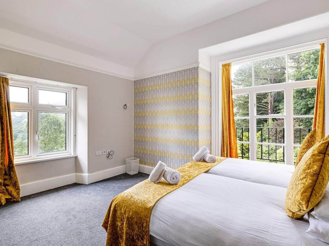 Tudor hall with hot tub, games room and sea views