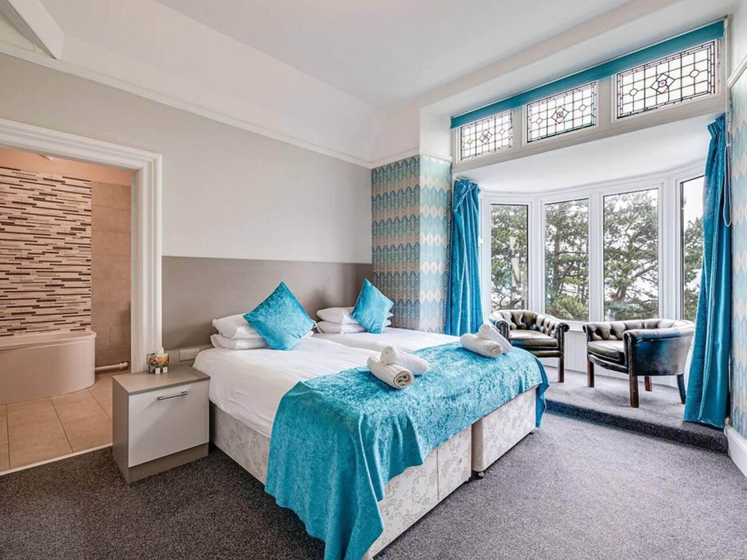 Tudor hall with hot tub, games room and sea views