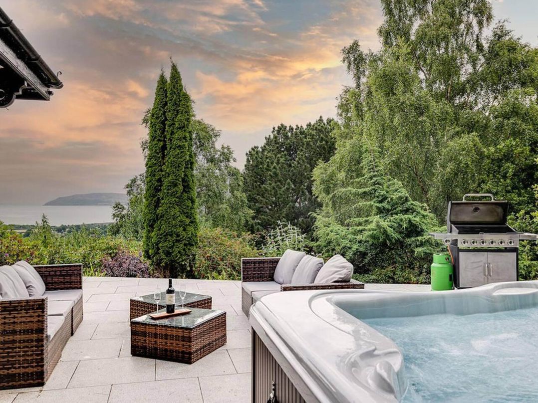 Tudor hall with hot tub, games room and sea views