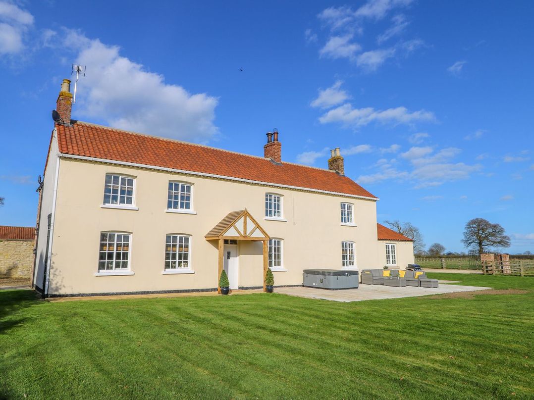 A house with patio furniture at Tuft House in Hovingham