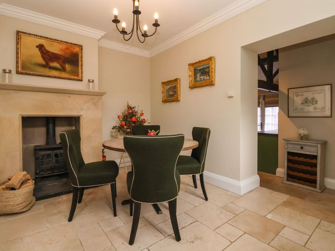 A dining room with a table and chairs at The Bothy in Knaresborough