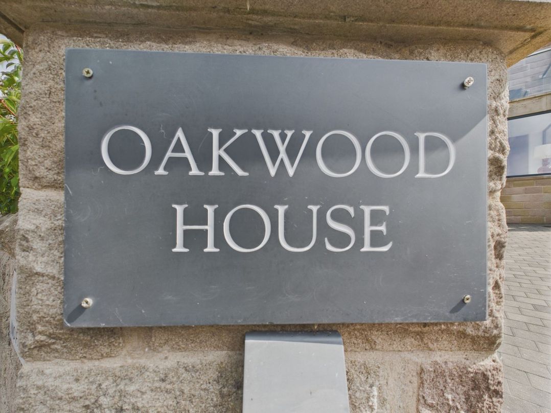 A house sign reading Oakwood House at Oakwood House in Tansley near Matlock