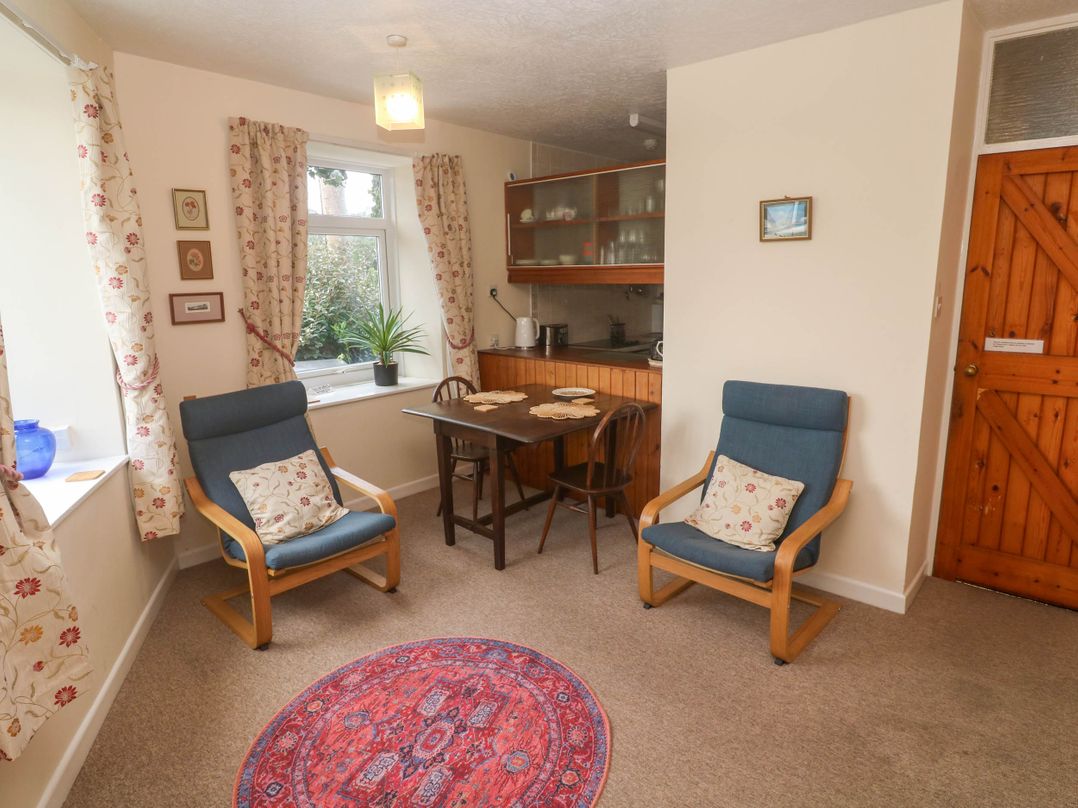 A dining room with table and chairs at Chyancrowse in Gulval