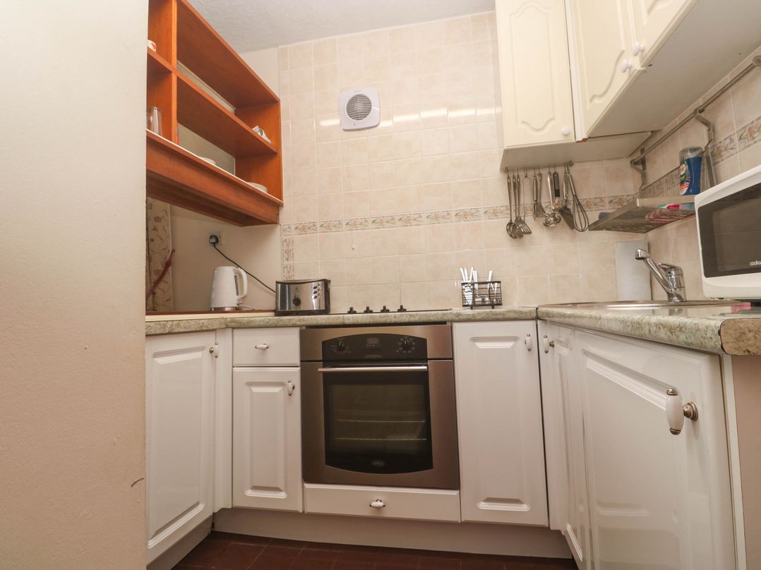 A kitchen with appliances and cabinetry at Chyancrowse in Gulval