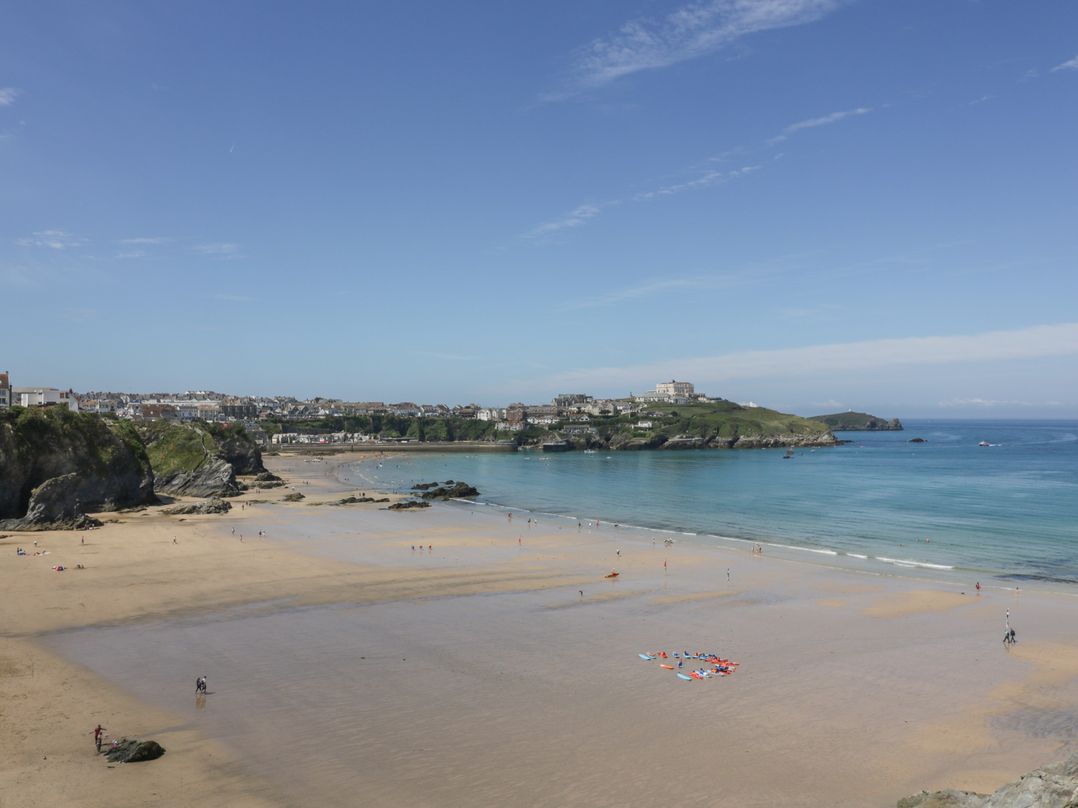 A beach with people at Shoreline Apartment No.8 in Newquay