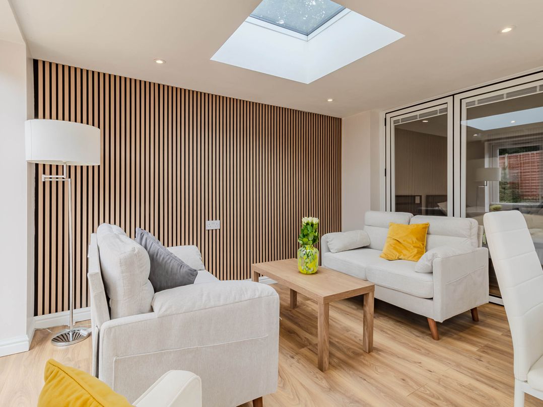 A living room with a coffee table and sofas at Loughborough Luxe Bungalow Retreat Sleeps 6 in Shepshed