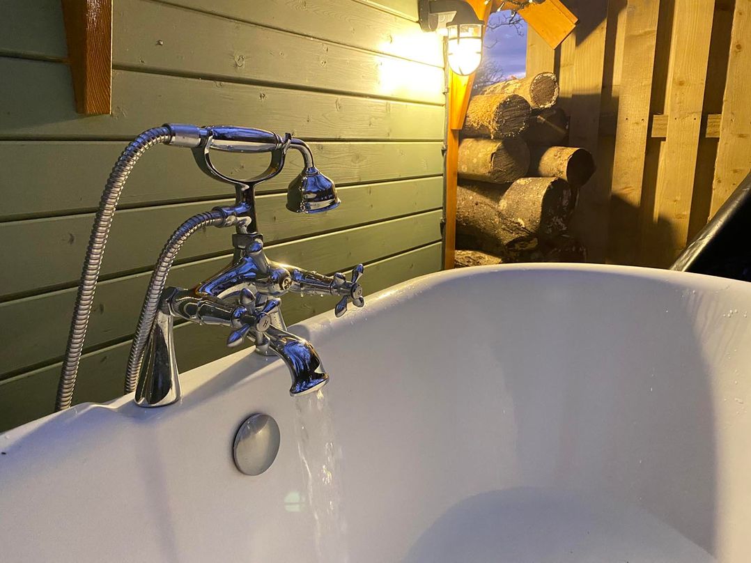 Punch Tree Cabins Outdoor Bath Wood Burner