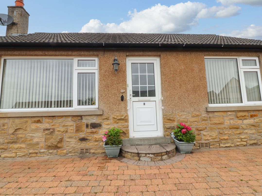 A front entrance with door and windows at Wynnville in Embsay near Skipton