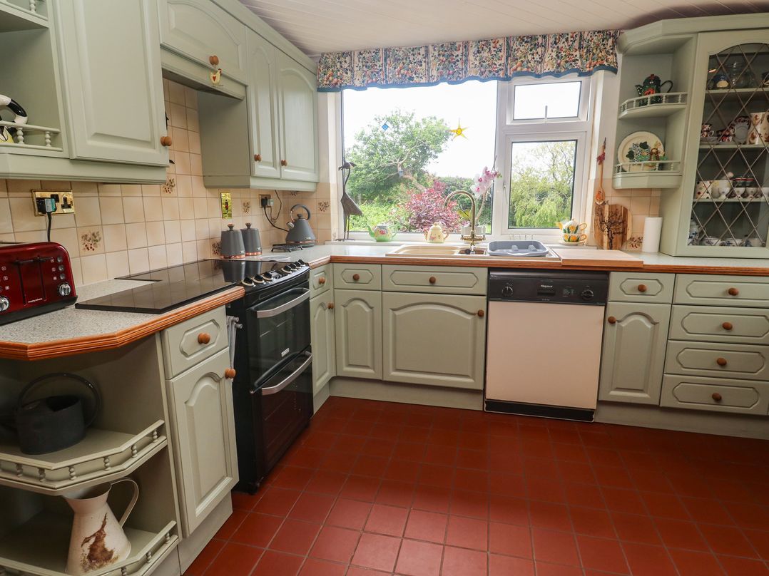 A kitchen with a sink and countertop at Woolly Welcome in Goldsithney